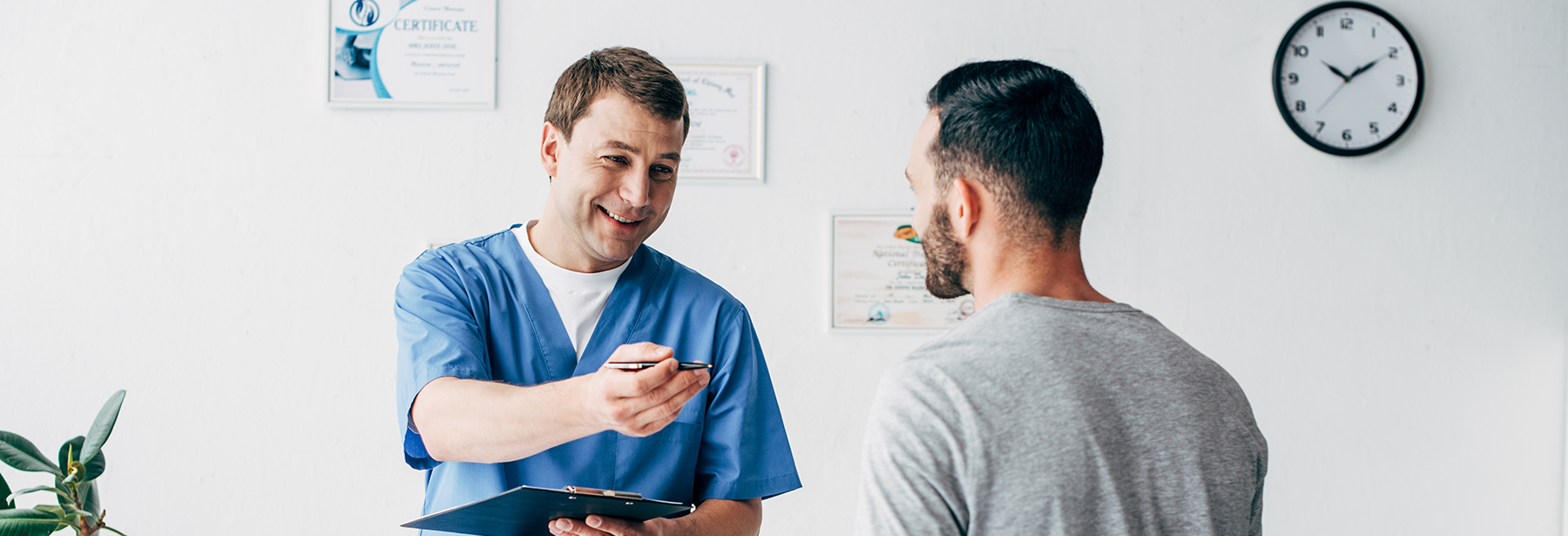 Male Medical Worker with Male Patient