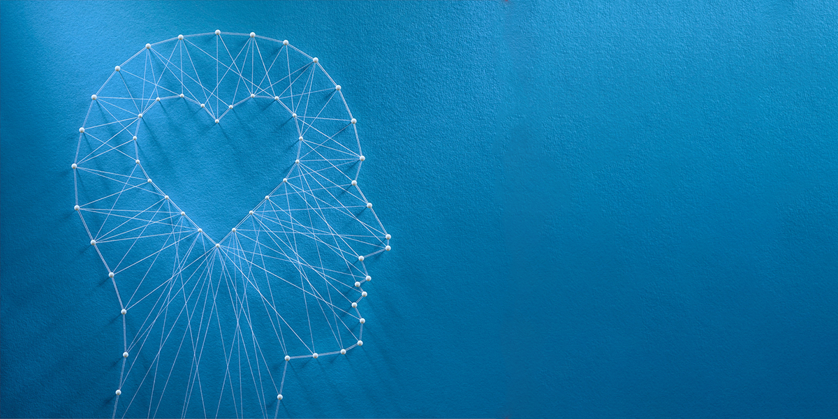 Pin and String art depicting a head with a heart