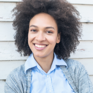 photo of a young, smiling black woman