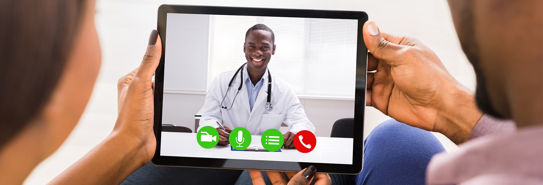 black doctor on tablet screen