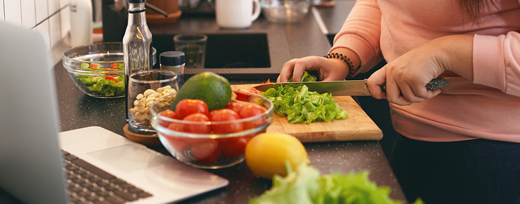 Woman Cutting Vegetables