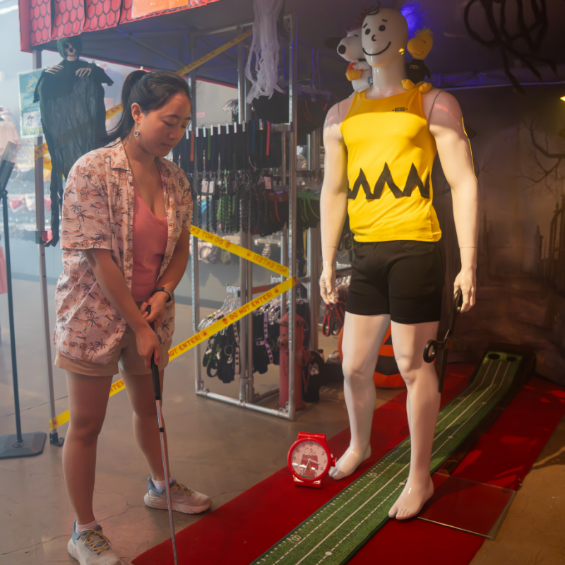 putt-putt clover classic 2025 hole using a Dallas Package mannequin to create a weirdly hot Charlie Brown