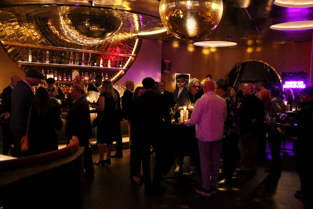 A photo from "Care, on the Rocks," an elevated evening for healthcare access, a fundraising event in 2025 held at EVEYLYN Dallas.
