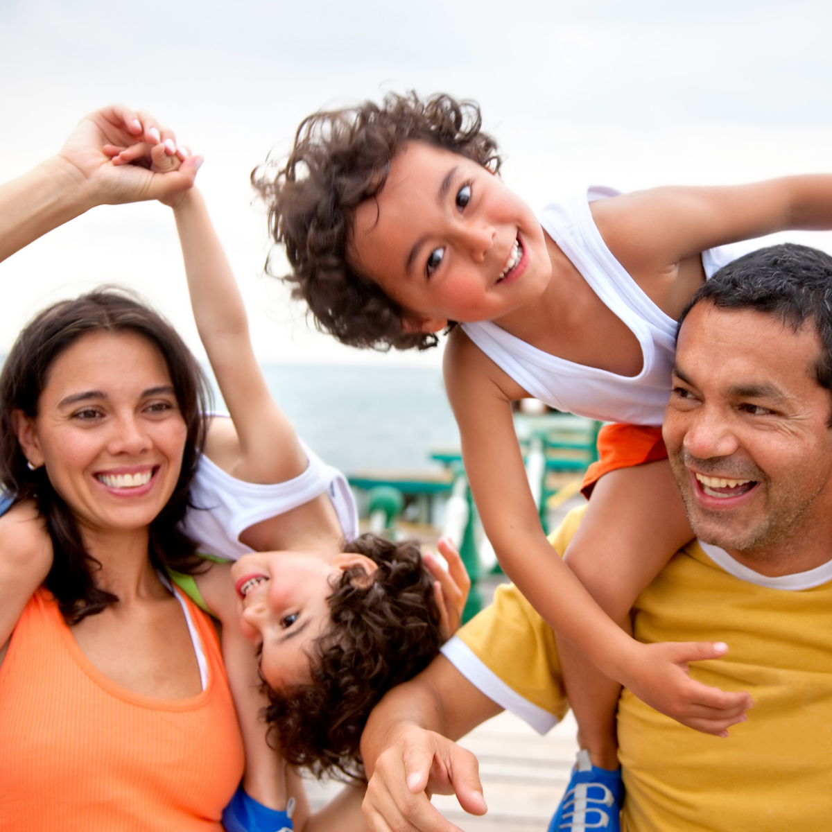 Hispanic Family Playing Outside